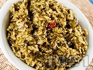 Рецепта Задушен спанак с ориз, стафиди и пресен зелен лук